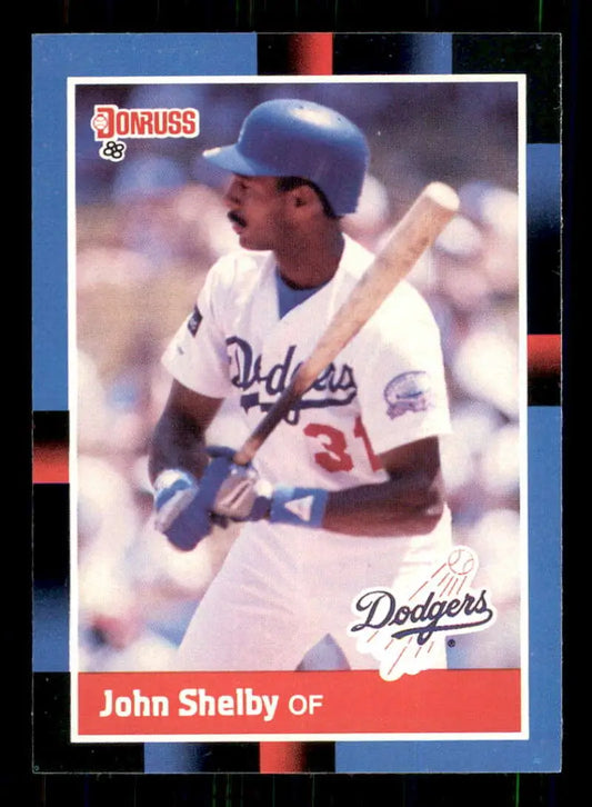 Baseball card of John Shelby batting in Dodgers home uniform for trading cards collection