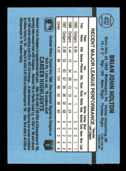 Baseball card back of Brian Holton showcasing stats on a light blue background