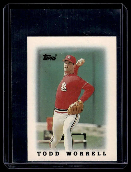 Baseball card of Todd Worrell in red uniform for St. Louis Cardinals Topps Major League