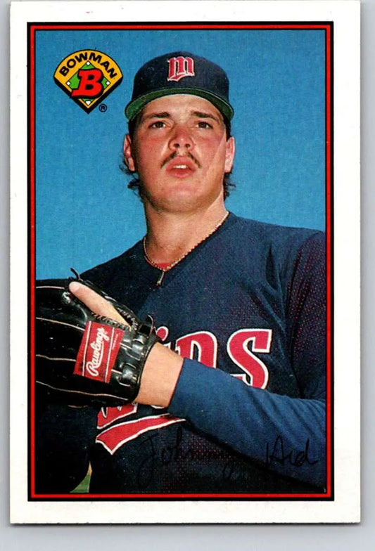 Johnny Ard Minnesota Twins baseball card in navy uniform against blue backdrop