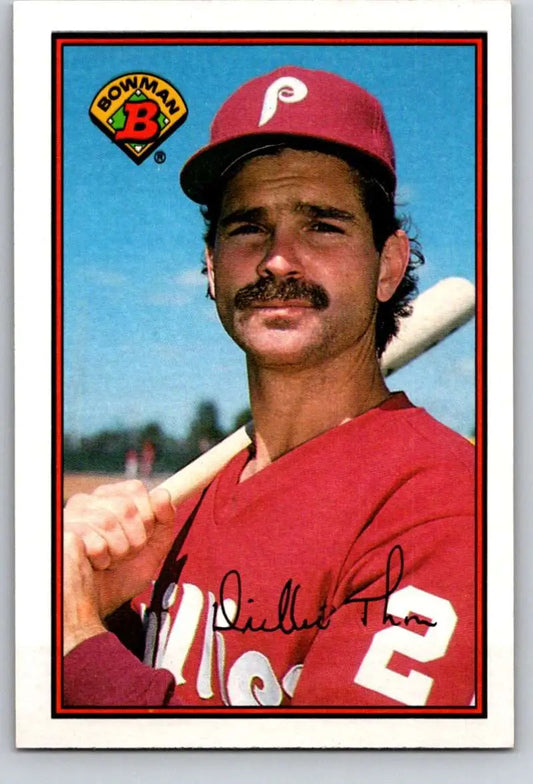 Dickie Thon in red Phillies uniform holding bat from 1989 baseball card