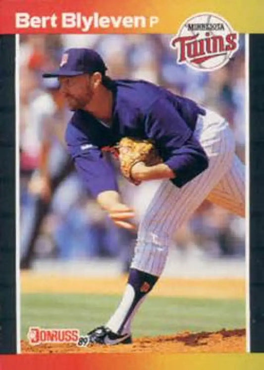 Minnesota Twins baseball card of Bert Blyleven in mid-delivery wearing a purple uniform