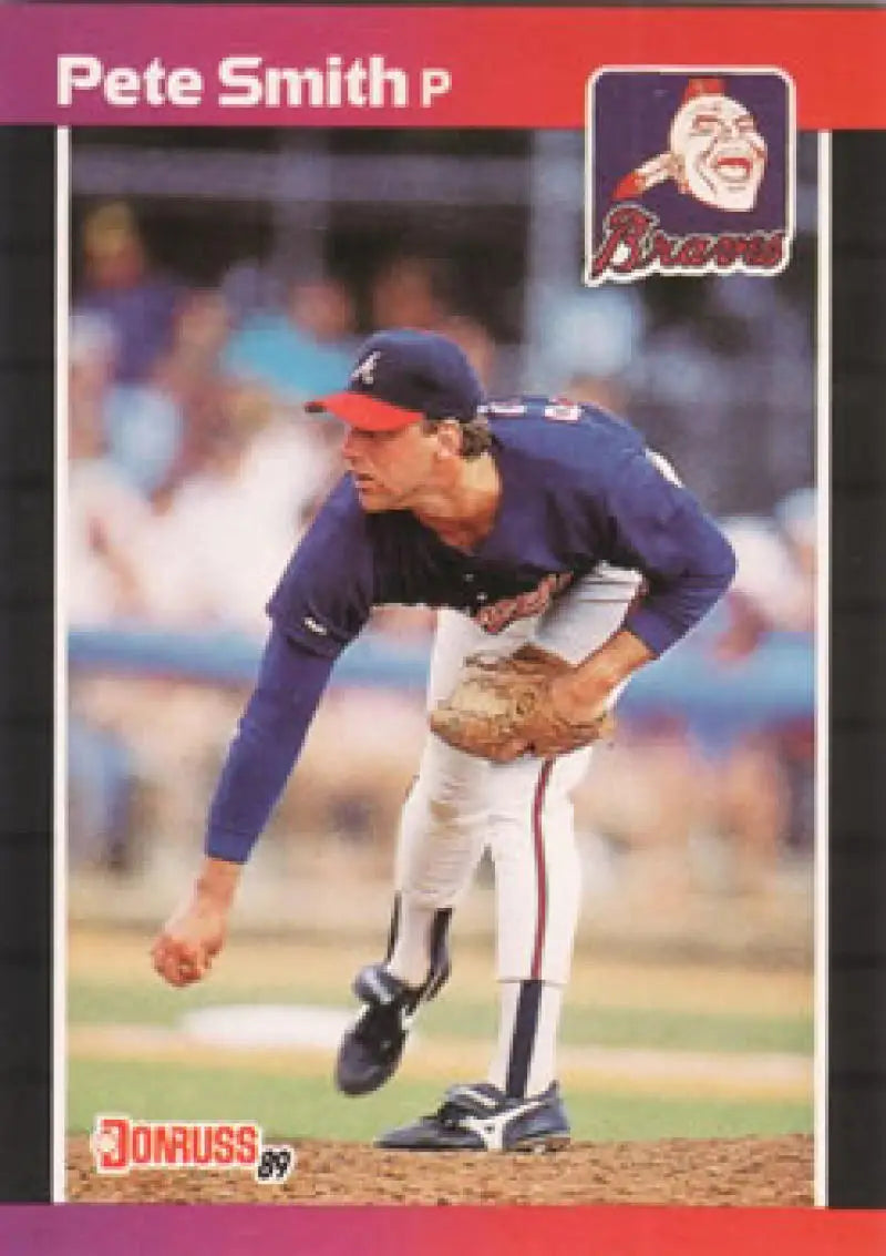 Baseball card of Pete Smith pitching in navy blue Atlanta Braves uniform