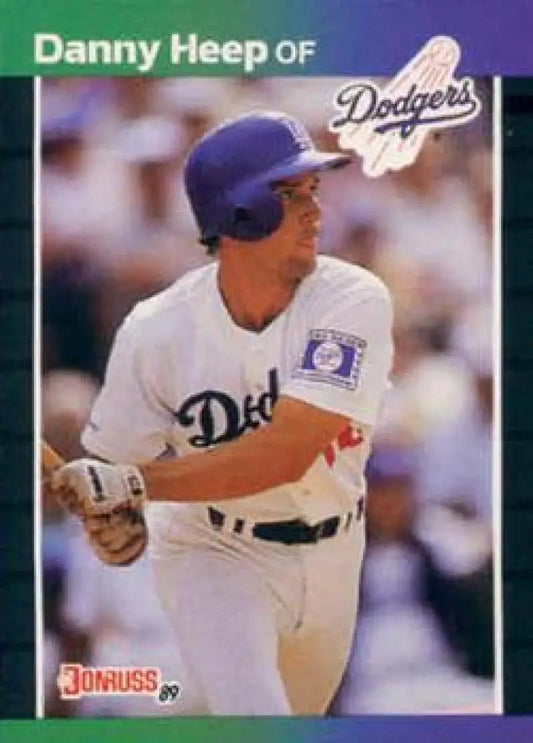 Danny Heep baseball card featuring Los Angeles Dodgers player in white uniform at bat