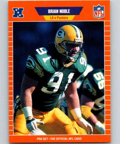 Football trading card of Green Bay Packers player Brian Noble in green and yellow uniform