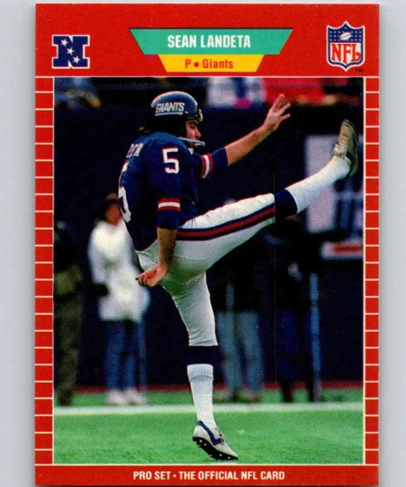 Red NFL football card of Sean Landeta punting in New York Giants uniform