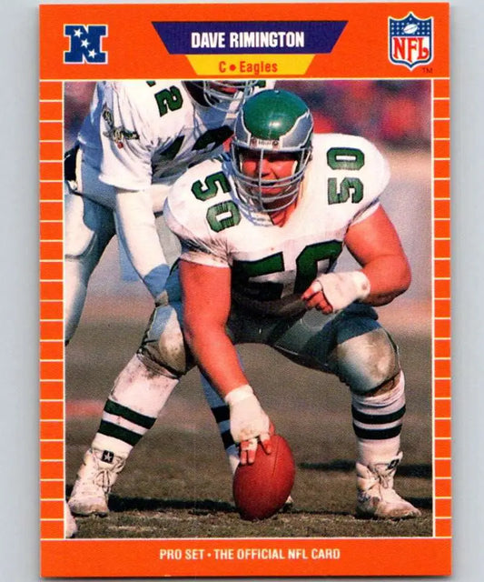 Orange-bordered NFL football card of Dave Rimington snapping the ball for Philadelphia Eagles