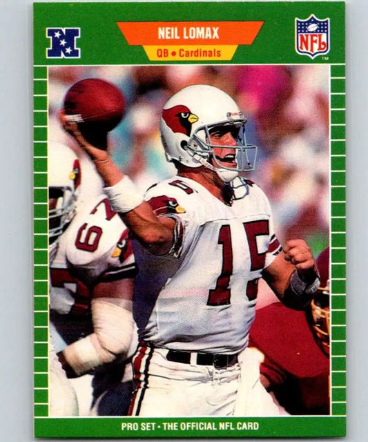 Football card of Neil Lomax in white uniform throwing a pass for Phoenix Cardinals