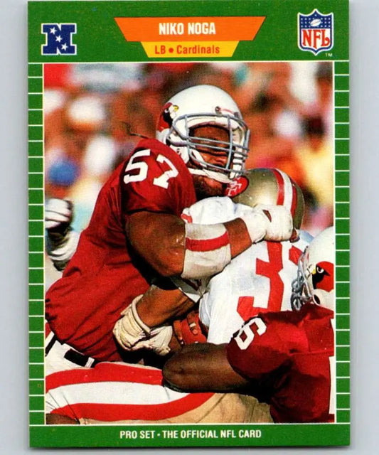 NFL trading card of Niko Noga tackling in red for Phoenix Cardinals Football Card