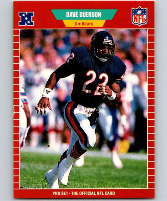 Dave Duerson in dark blue Chicago Bears uniform running with football on 1989 card