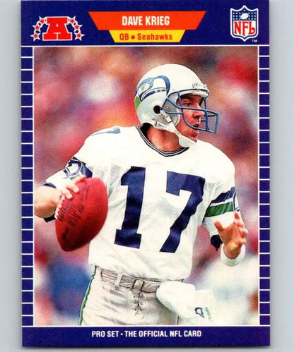 NFL football card of Dave Krieg, Seattle Seahawks quarterback in white jersey number 17