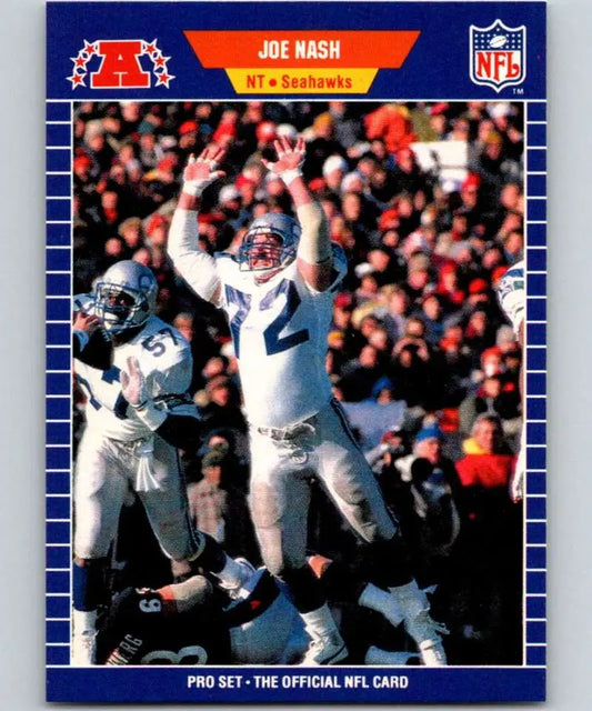 NFL trading card of Joe Nash leaping to defend a pass for Seattle Seahawks football