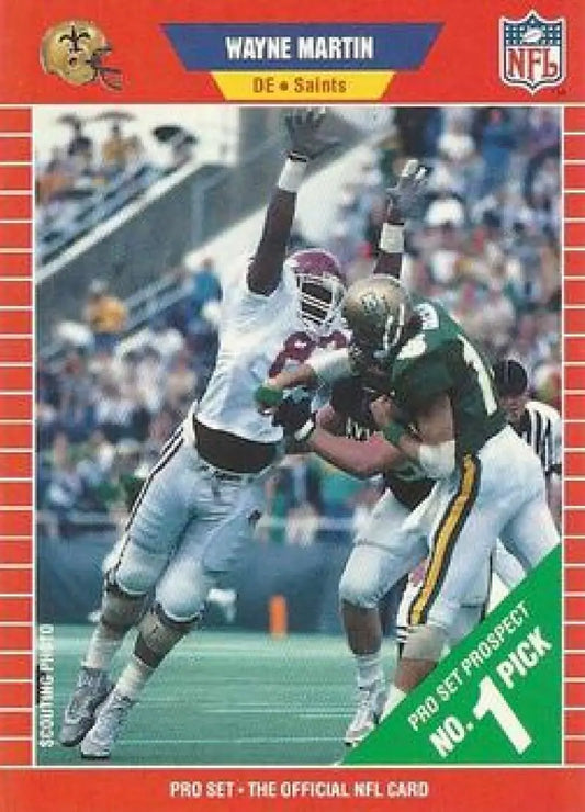 NFL trading card of Wayne Martin blocking a pass during a New Orleans Saints game