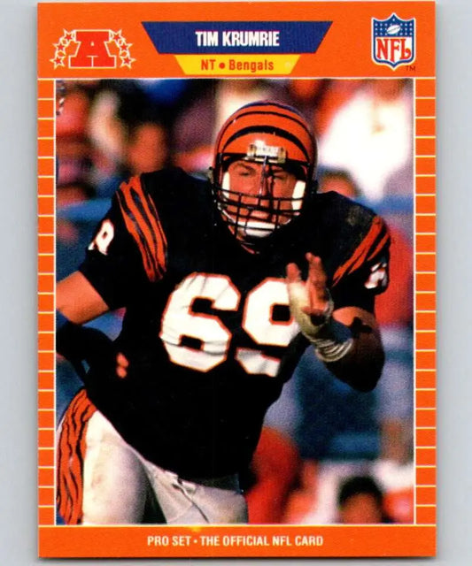 Orange-bordered Pro Set card of Tim Krumrie, Cincinnati Bengals player number 69