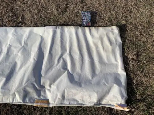 Wrinkled off-white rectangular tarp for 1989 Star Trek Final Frontier movie vinyl banner