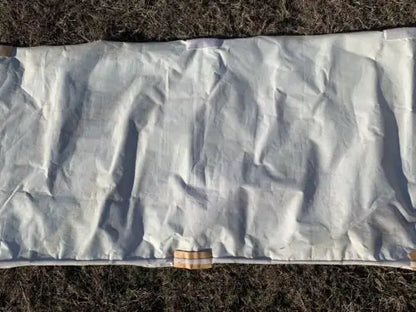 Wrinkled white tarp featuring 1989 Star Trek V The Final Frontier movie vinyl poster banner