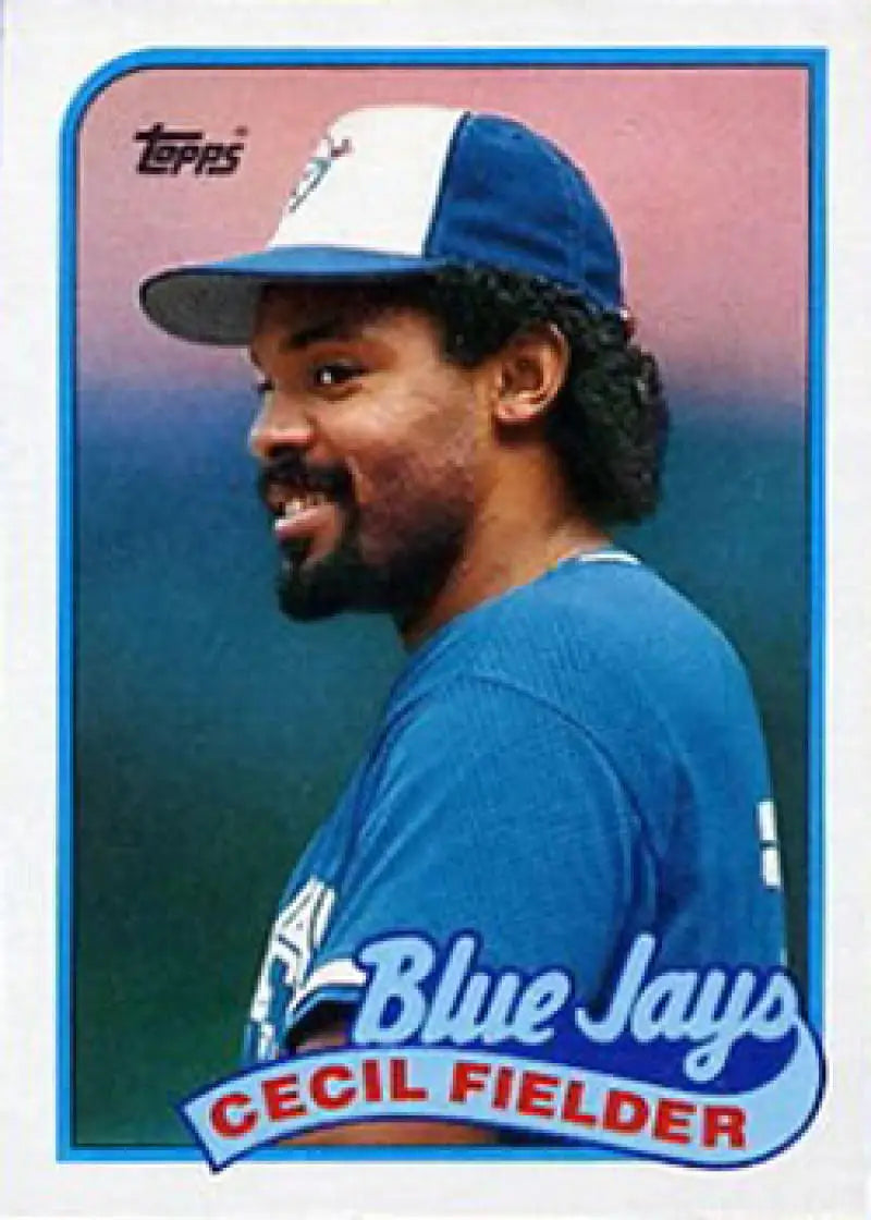 Vintage Topps baseball card of Cecil Fielder from the Toronto Blue Jays in blue uniform