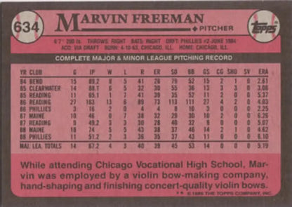 Baseball card of Marvin Freeman with career stats on a pink background for Philadelphia Phillies