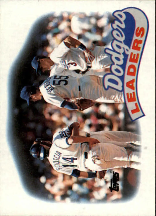 Baseball card of Orel Hershiser with Los Angeles Dodgers players in white uniforms
