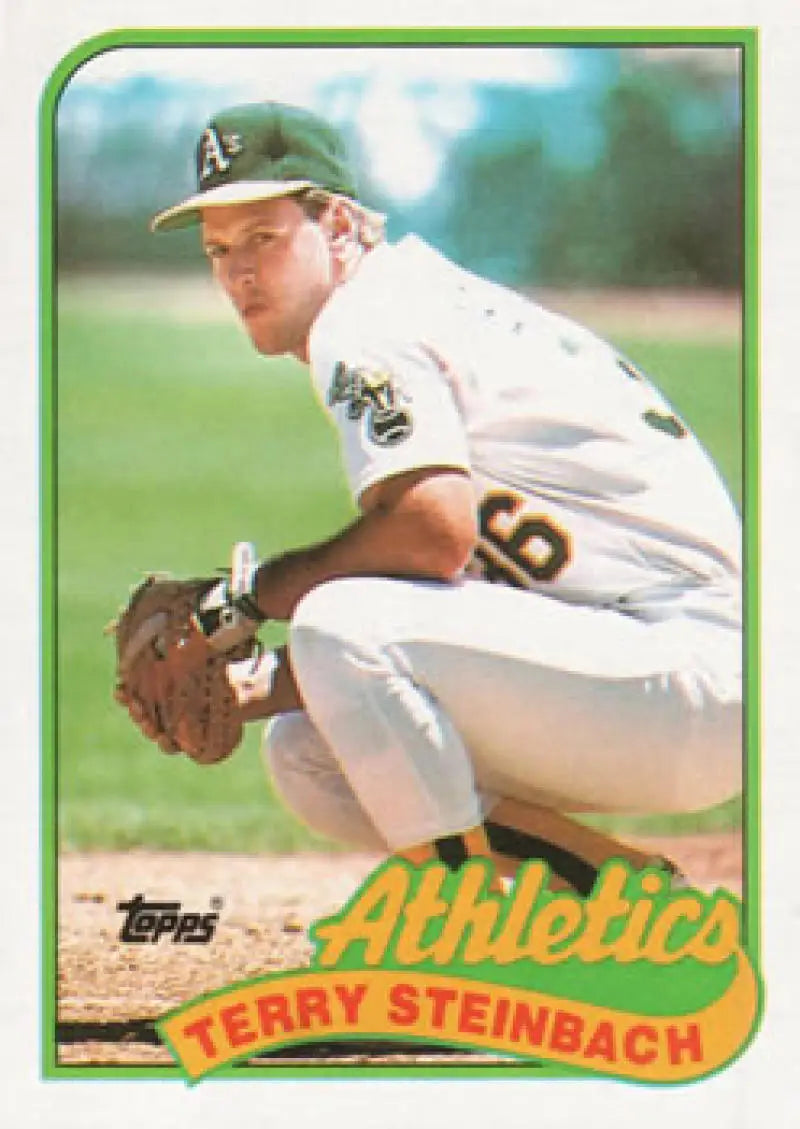 Terry Steinbach crouching in delivery on 1989 Topps #725 Oakland Athletics Baseball Card
