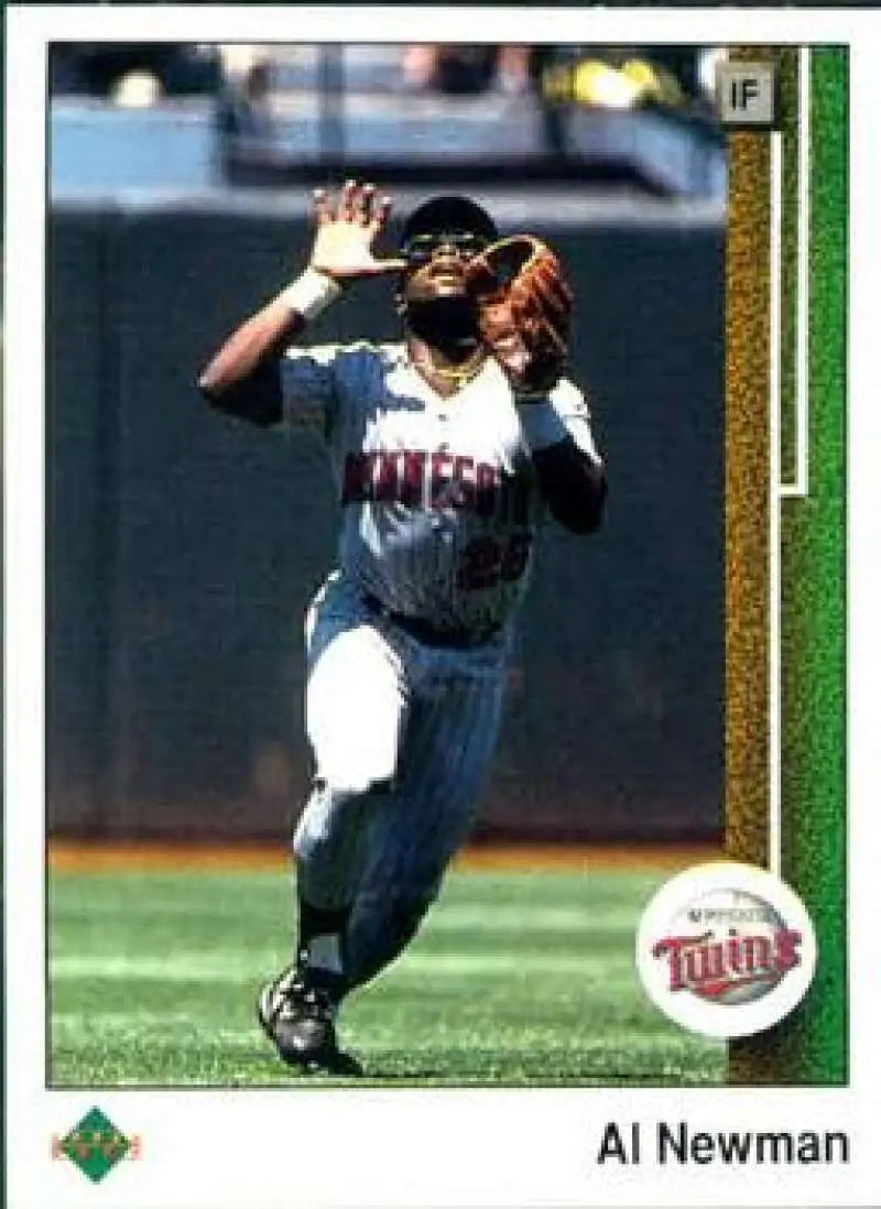 Baseball player in Minnesota Twins uniform making a catch on 1989 Upper Deck baseball card