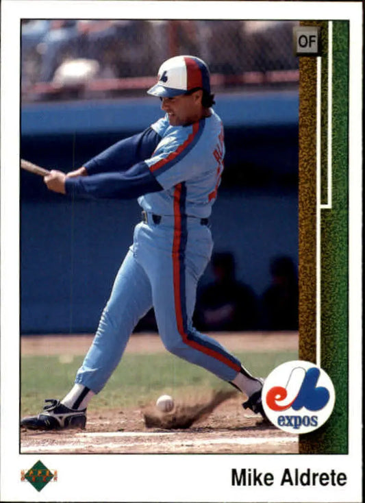 Baseball player in Montreal Expos uniform swinging bat on Upper Deck baseball card