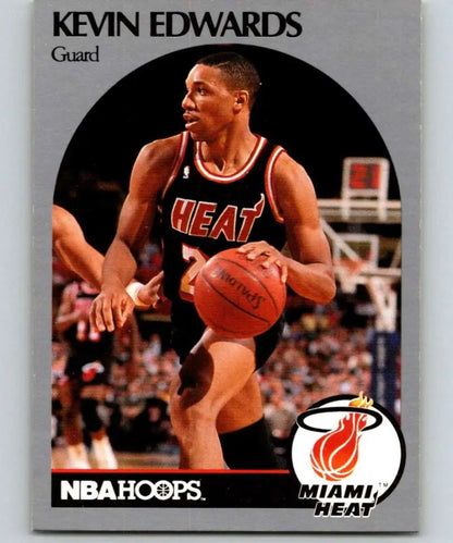Basketball player Kevin Edwards dribbling in Miami Heat uniform during a game