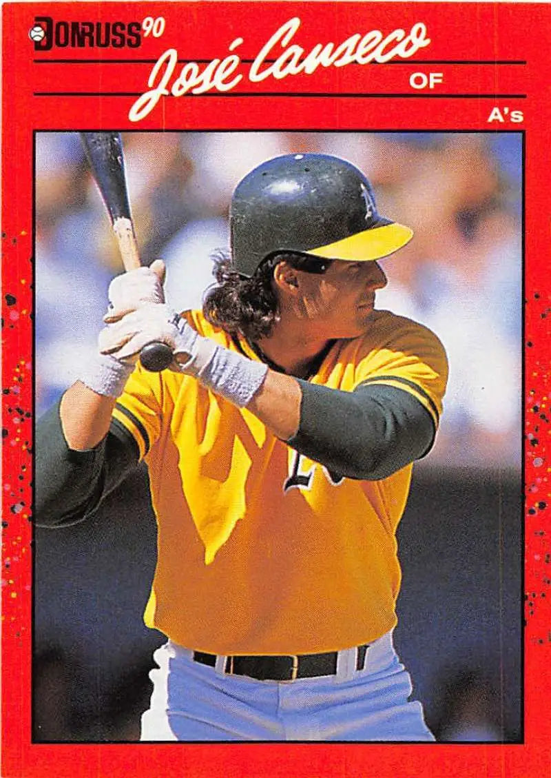 1990 Donruss Jose Canseco baseball card featuring Oakland Athletics player at bat
