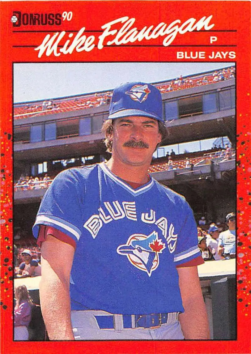 1990 Donruss Mike Flanagan baseball card featuring Toronto Blue Jays player in blue uniform