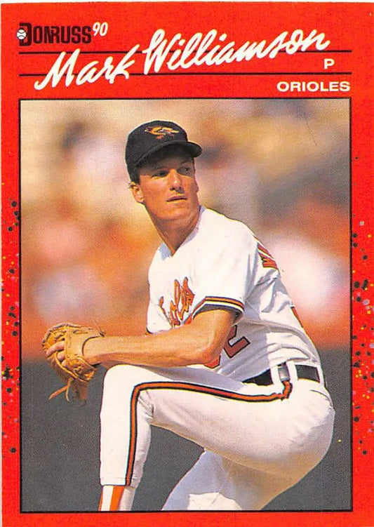 1990 Donruss baseball card of Orioles pitcher Mark Williamson in mid-delivery