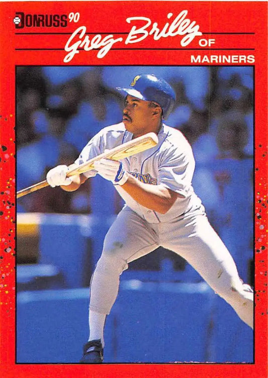 Red-bordered 1990 Donruss Greg Briley baseball card of Seattle Mariners player bunting