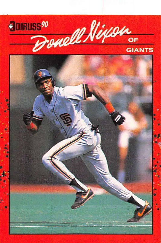 1990 Donruss #571 Donell Nixon baseball card showcasing Giants player running bases