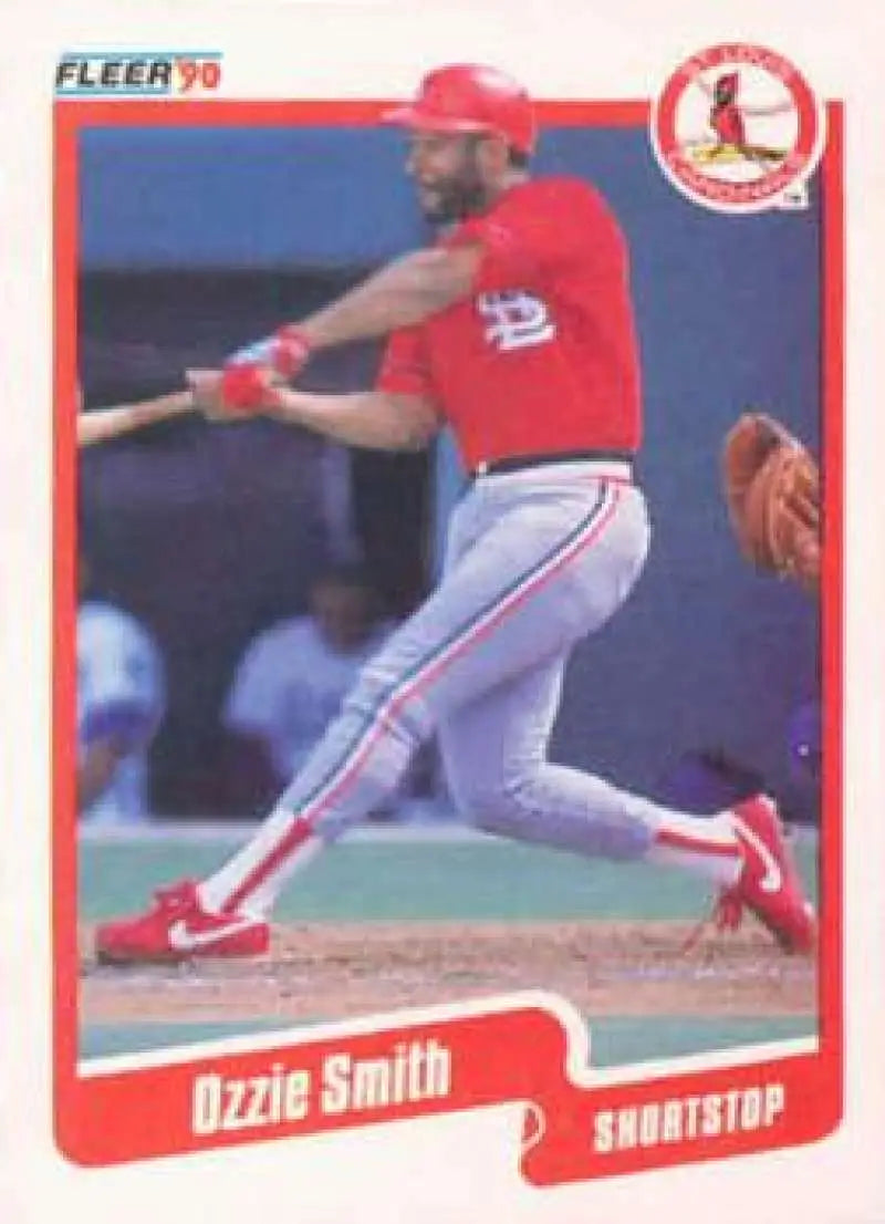 Ozzie Smith mid-swing on a St. Louis Cardinals baseball card from 1990 Fleer