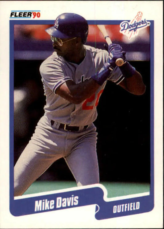 1990 Fleer #391 Mike Davis NM-MT Los Angeles Dodgers Baseball Card featuring outfielder at bat