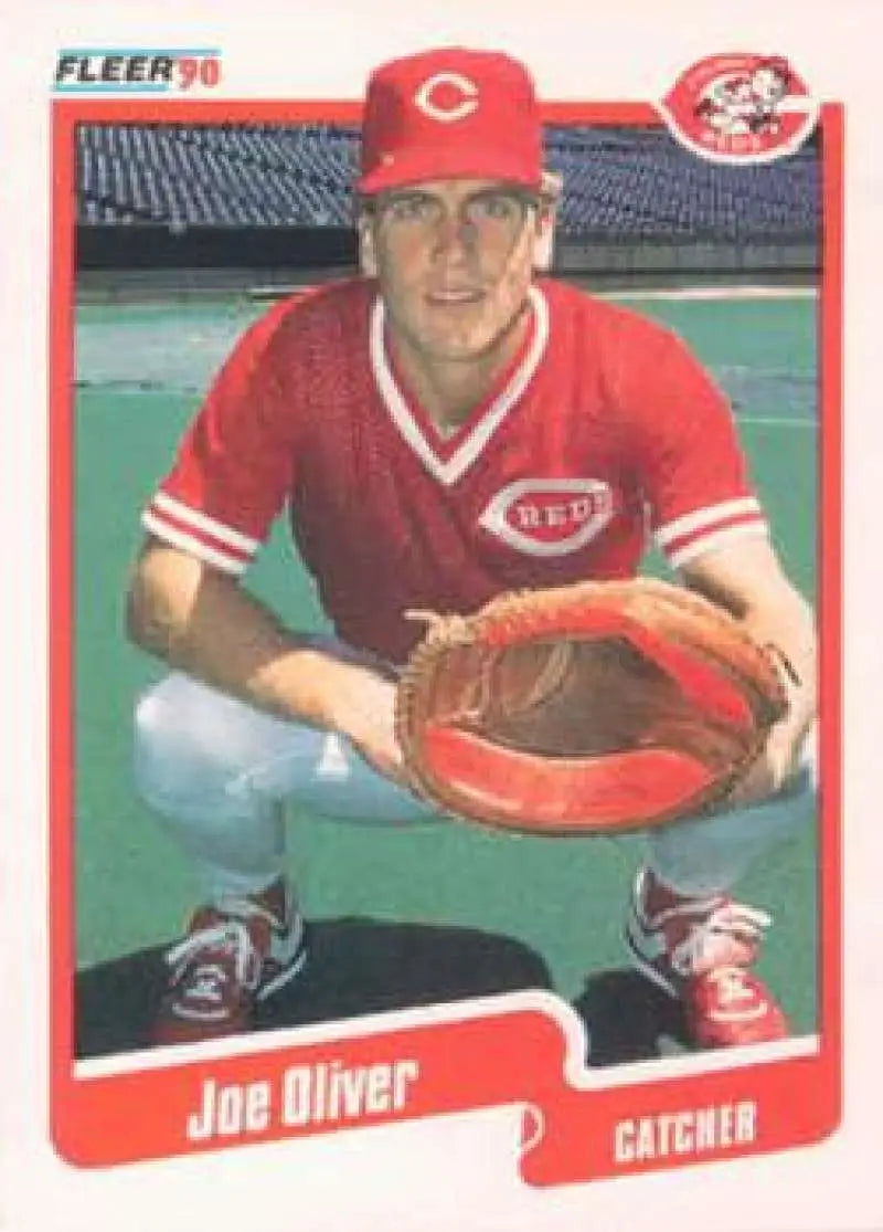 Baseball card of Joe Oliver, Cincinnati Reds catcher in uniform with mitt