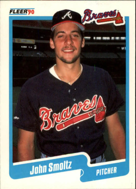 1990 Fleer John Smoltz baseball card featuring Atlanta Braves pitcher in navy jersey