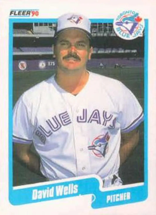 Vintage Fleer baseball card of David Wells, Toronto Blue Jays pitcher in home uniform