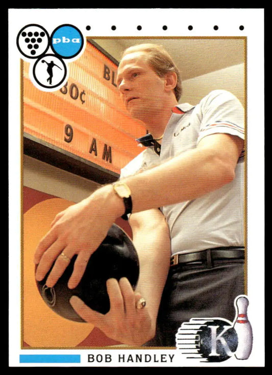 Professional bowler Bob Handley seated with bowling ball at a PBA Bowling alley