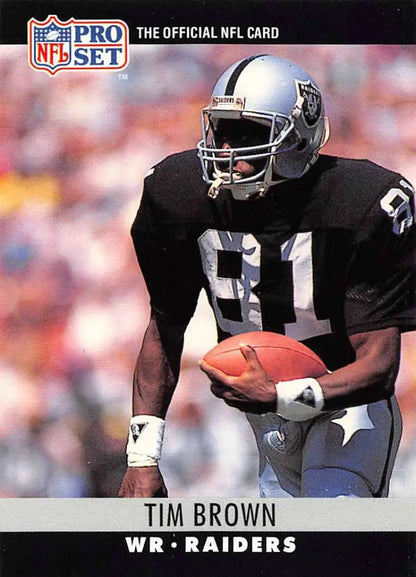 Tim Brown Los Angeles Raiders NFL Pro Set trading card in black uniform with football