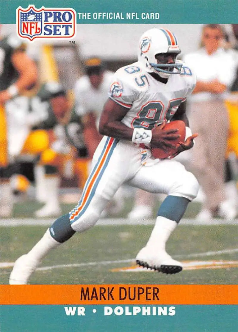 NFL Pro Set trading card of Mark Duper in Miami Dolphins uniform carrying football