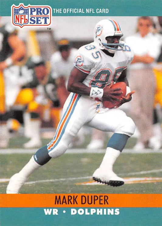 NFL Pro Set trading card of Mark Duper in Miami Dolphins uniform carrying football