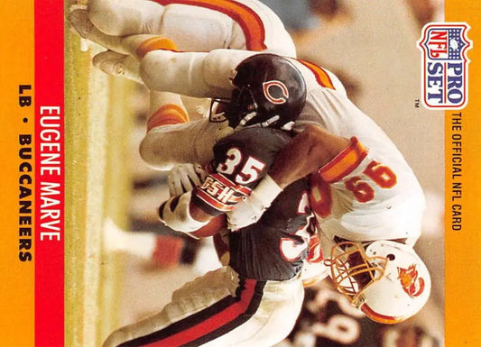 Football player Eugene Marve from the Tampa Bay Buccaneers being tackled