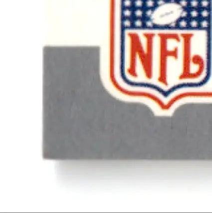 Part of an NFL shield logo sticker on 1990 Pro Set Jerry Rice Super Bowl MVP collectible