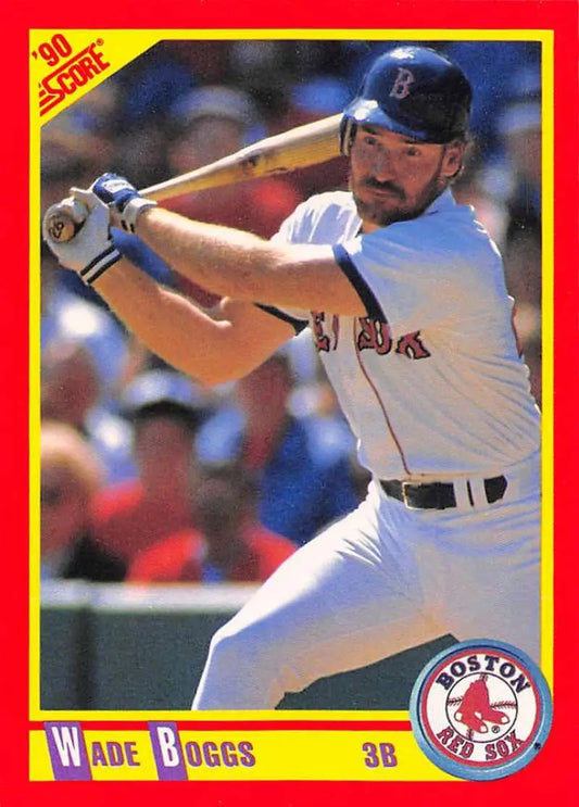 Wade Boggs in Boston Red Sox uniform swinging bat on baseball card 1990 Score #245