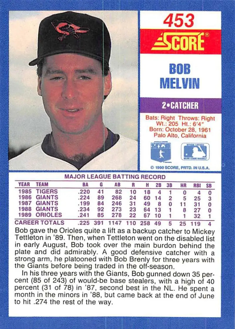 1990 Score Bob Melvin Baseball Card of Baltimore Orioles catcher in black cap