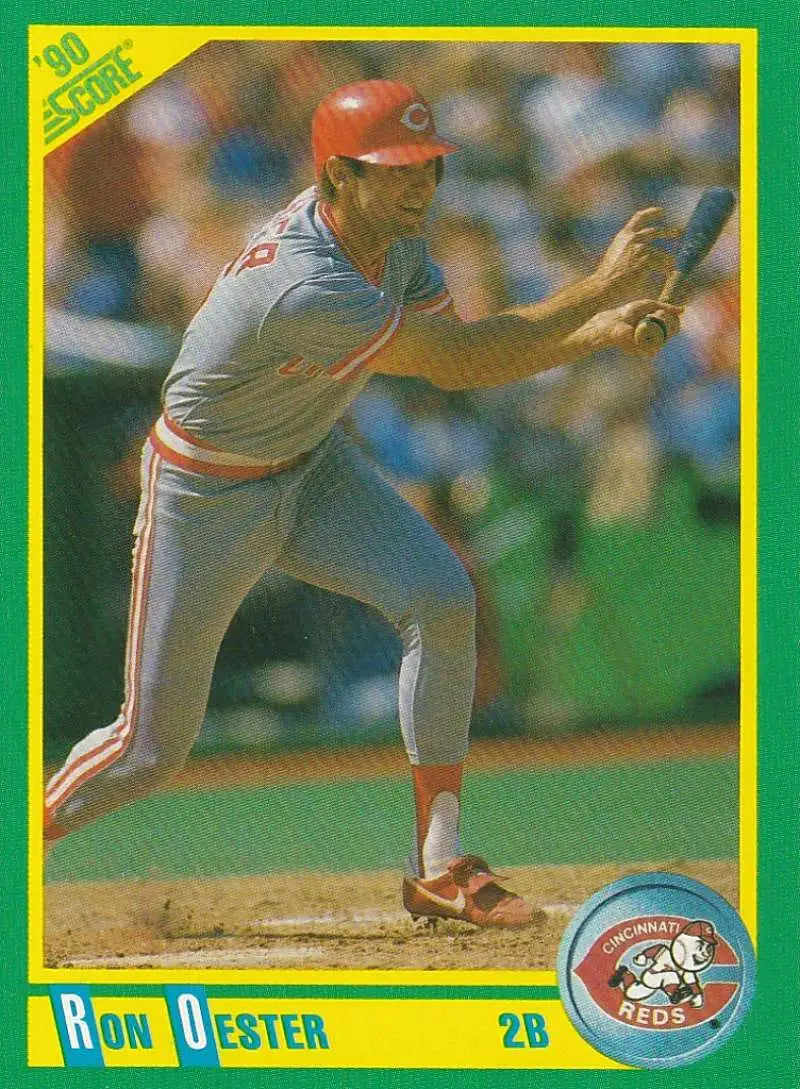 Ron Oester mid-pitching action on a Cincinnati Reds baseball card 1990 Score #59