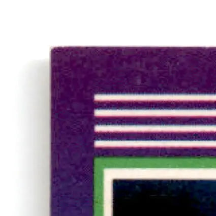 Corner of a purple score football jerry rice San Francisco 49ers card with white and green borders