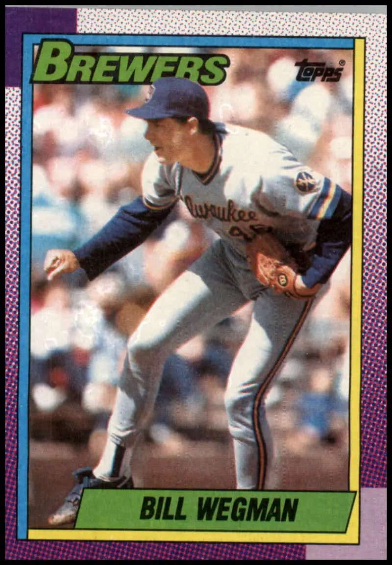 1990 Topps Bill Wegman baseball card of Milwaukee Brewers pitcher in delivery
