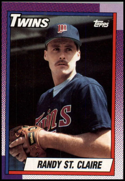 Minnesota Twins baseball card of Randy St. Claire in navy uniform from 1990 Topps