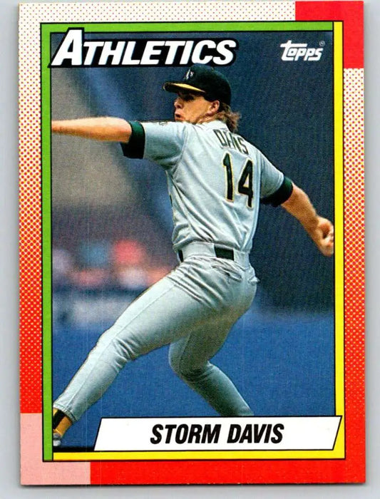 1990 Topps Storm Davis baseball card featuring Oakland Athletics pitcher in gray uniform